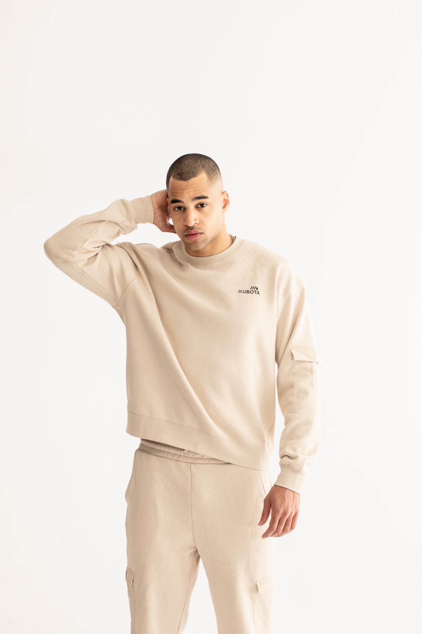 KUBOTA BLUZA UNISEX Z BEŻOWĄ KIESZONKĄ